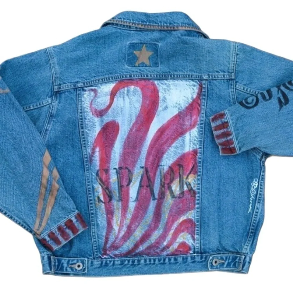 Vintage faded denim classic jean jacket. Retro cut with hand painted images